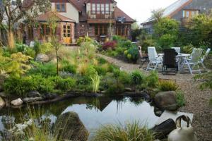 View 3 from project Leafy Garden With Water Feature in Rush